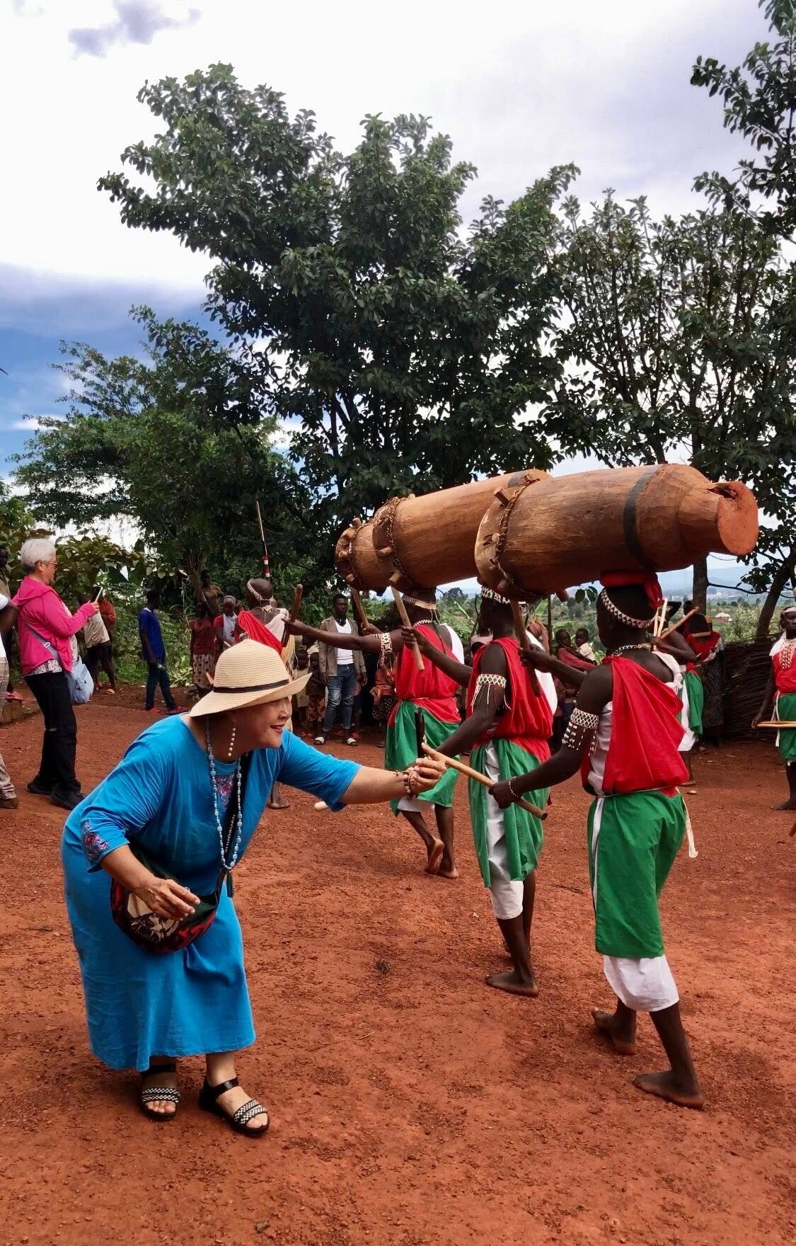 Burundian royal drummers carrying their drums in procession
